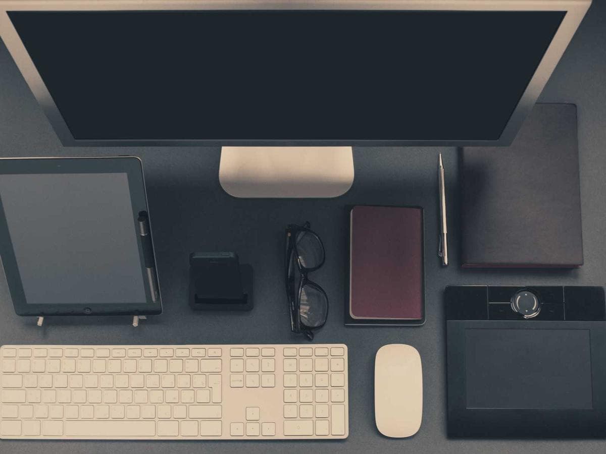 Placeholder photograph of a desk workspace viewed from above.