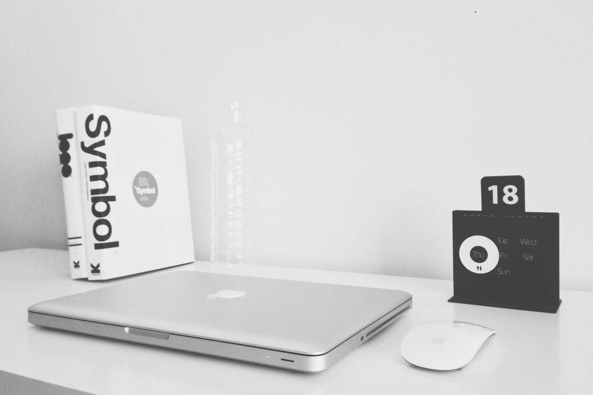 Placeholder photograph of a minimal white desk.